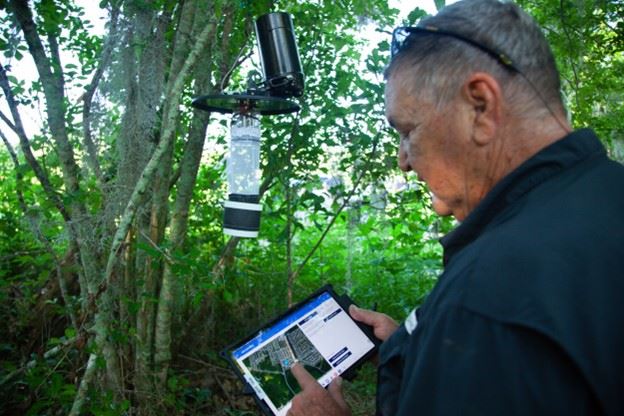 Man Researching Mosquitoes in the Field (JPG)